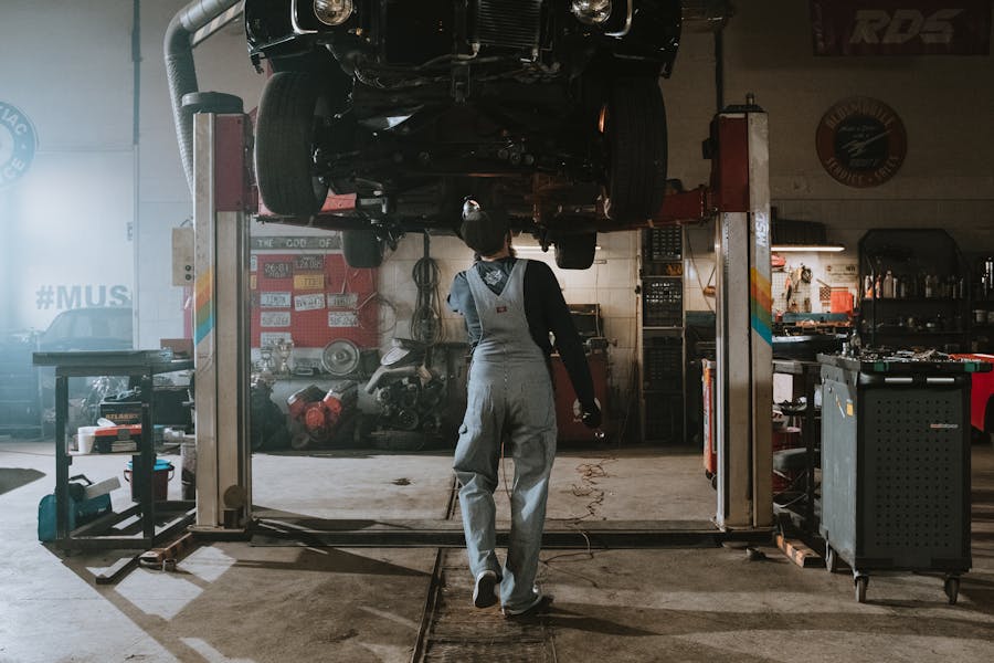 a mechanic working on a car